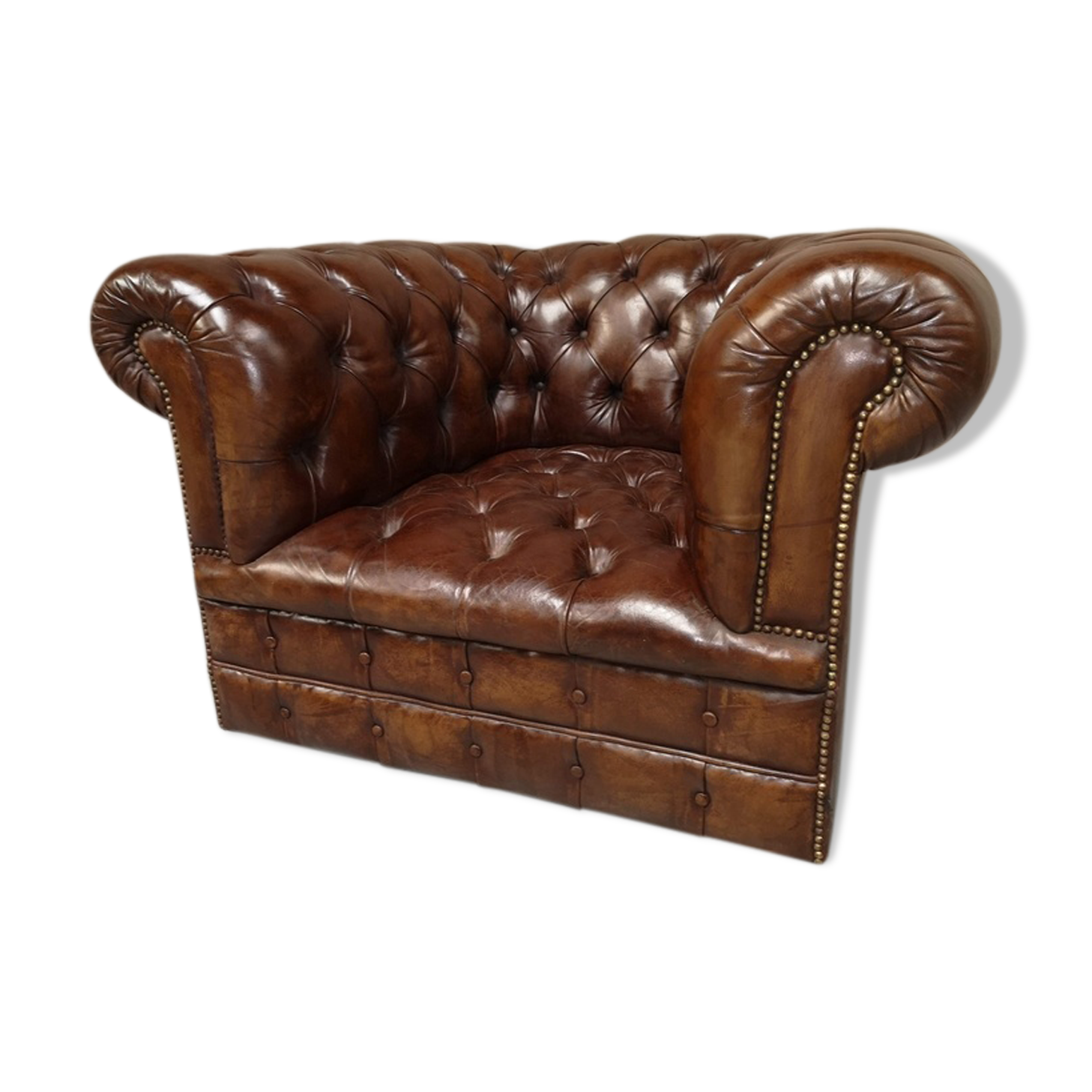 Padded Brown chesterfield armchair