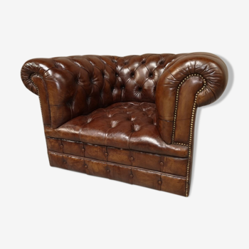 Padded Brown chesterfield armchair