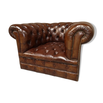 Padded Brown chesterfield armchair