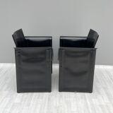 Pair of armchairs in black leather