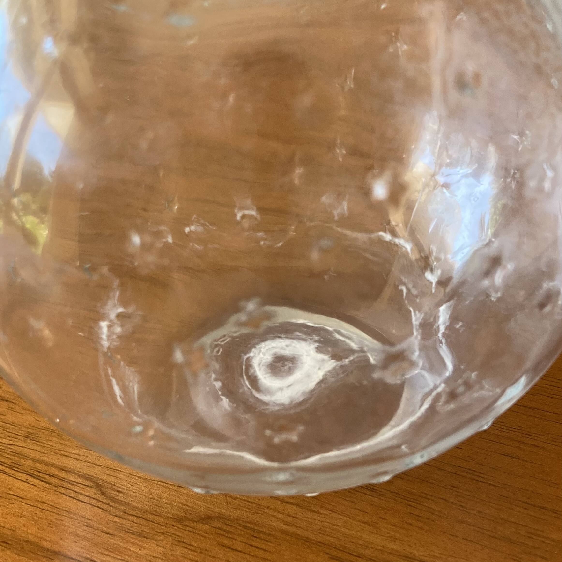 Lalique soliflore ball vase in colorless molded glass with light relief decoration of a seedling of stars