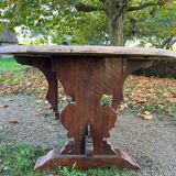 Oval oak monastery table with 2 leaves