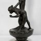 Vase en étain « Jeune femme cueillant un nénuphar », signé P. Jean, Art Nouveau début XXe