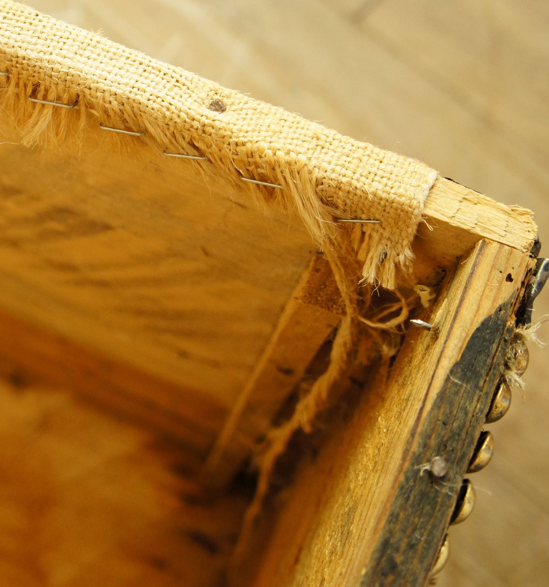 Old-curved wooden trunk - burlap
