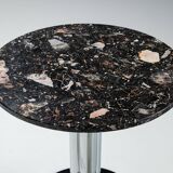 Round sidetable with stone top and three chromed legs