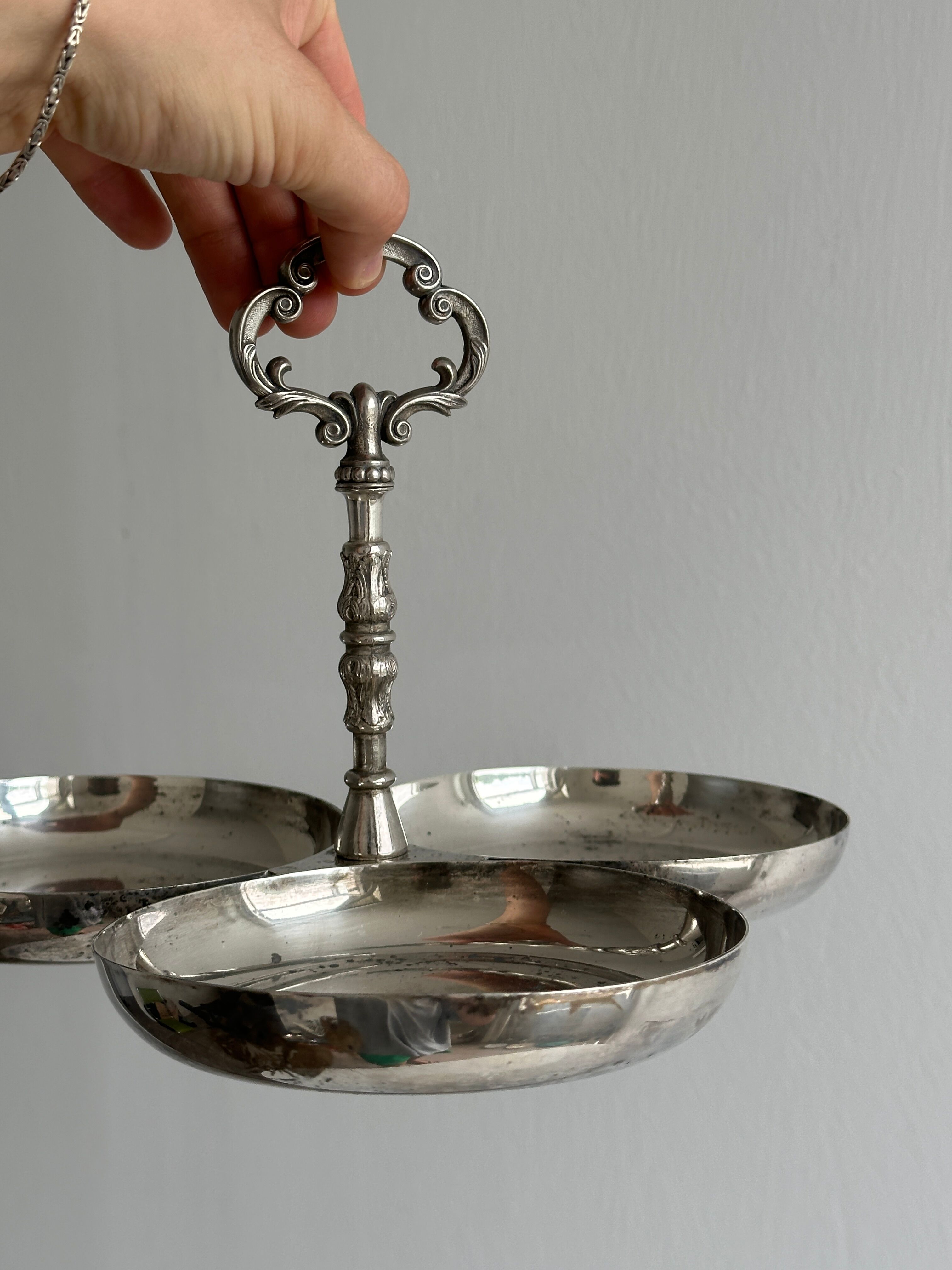 antique tripartite dish with carved handle