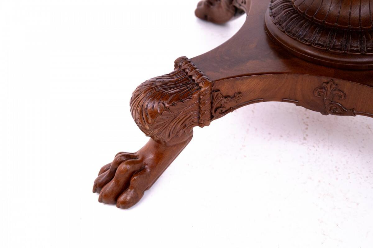Late 19th century lion's paw table with chairs, Northern Europe.