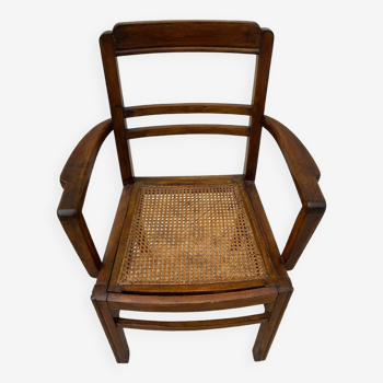 Cane armchair with armrests