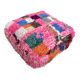 Berber floor pouf: Handwoven Moroccan wool cushion.