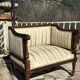 Low armchair in finely carved wood in the Louis XVI style from the 19th century