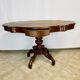 Violin-shaped pedestal table