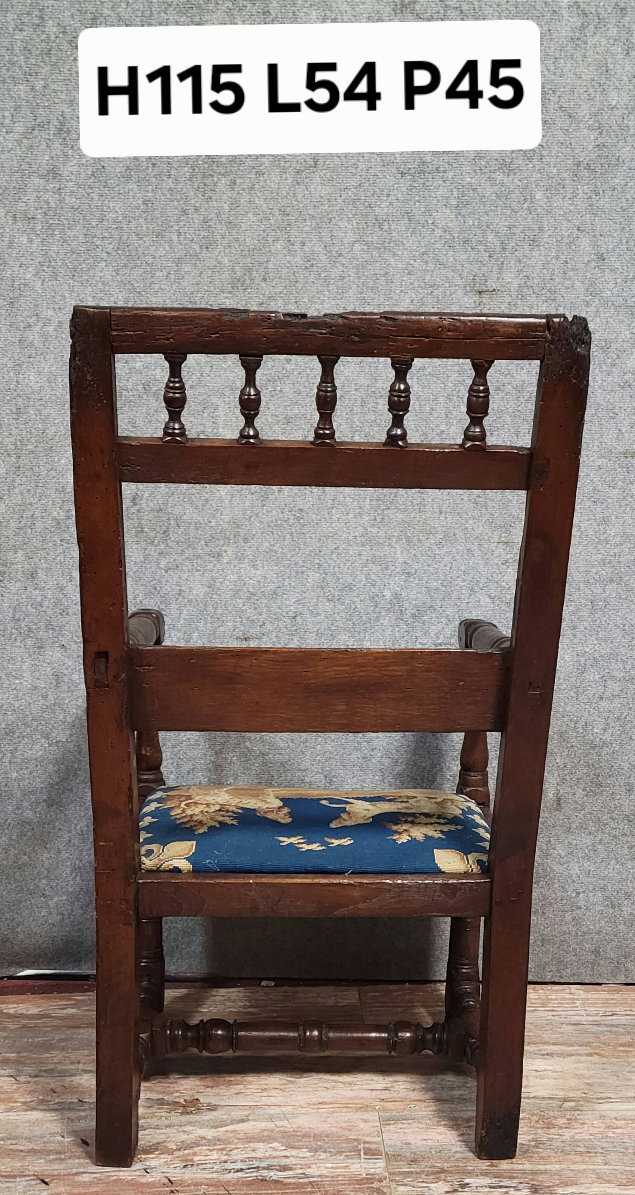 Louis XIII period armchair in solid wood