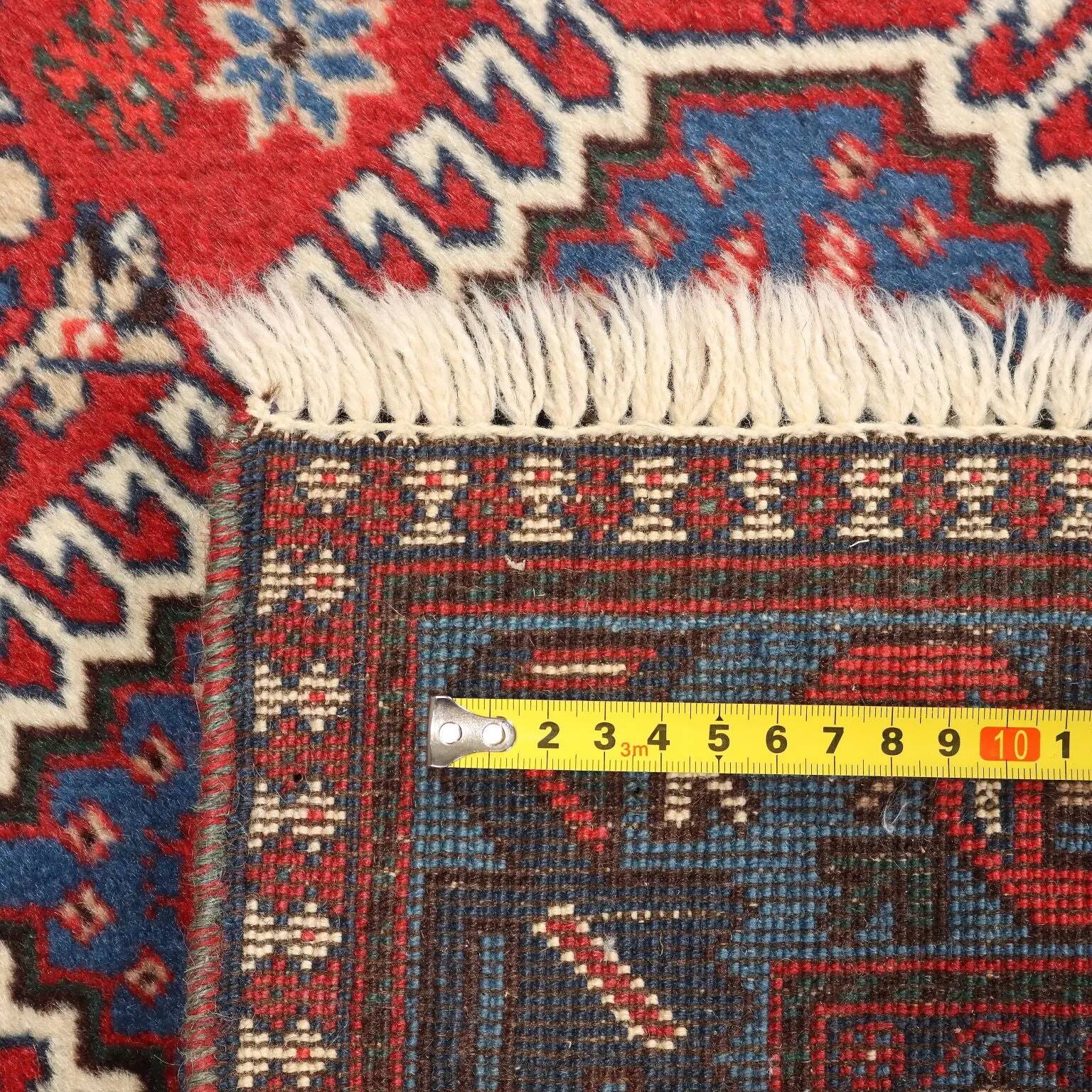 Ancient Asian wool rug, hand-knotted, 79 x 34 in.