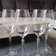 Set of 4 large red wine glasses. With a long twisted stem. Signed Schott Zwiesel. High 27 cm