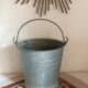 Old bucket in vintage zinc pot cache
