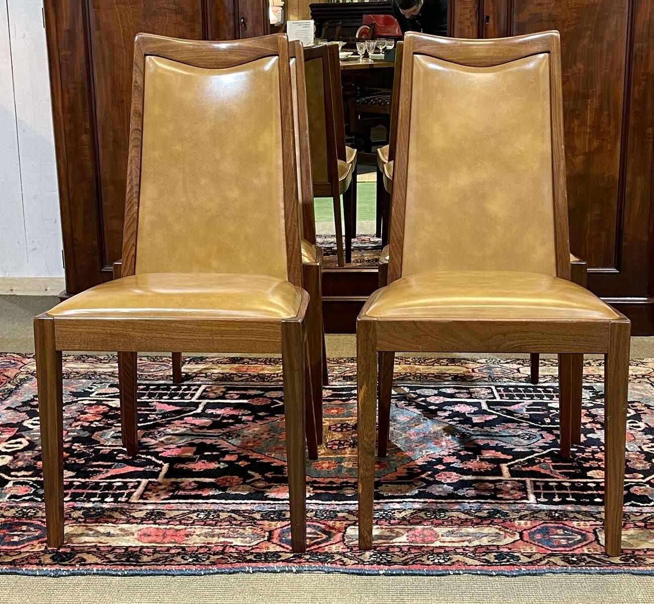 Set of 4 G-Plan chairs in teak and faux leather from the 1970s.
