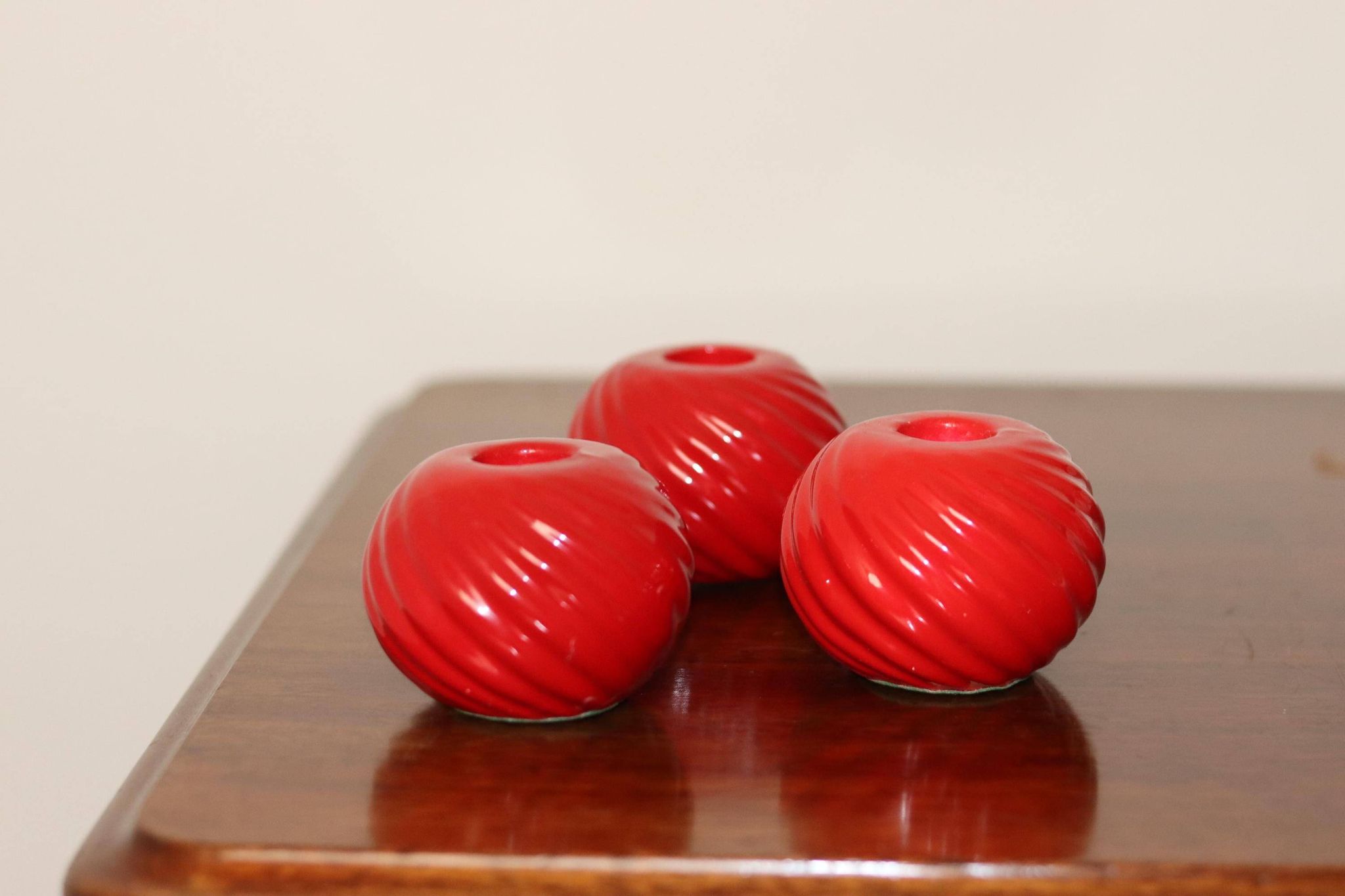 Trio of ceramic candleholders
