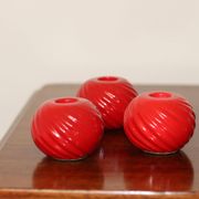 Trio of ceramic candleholders