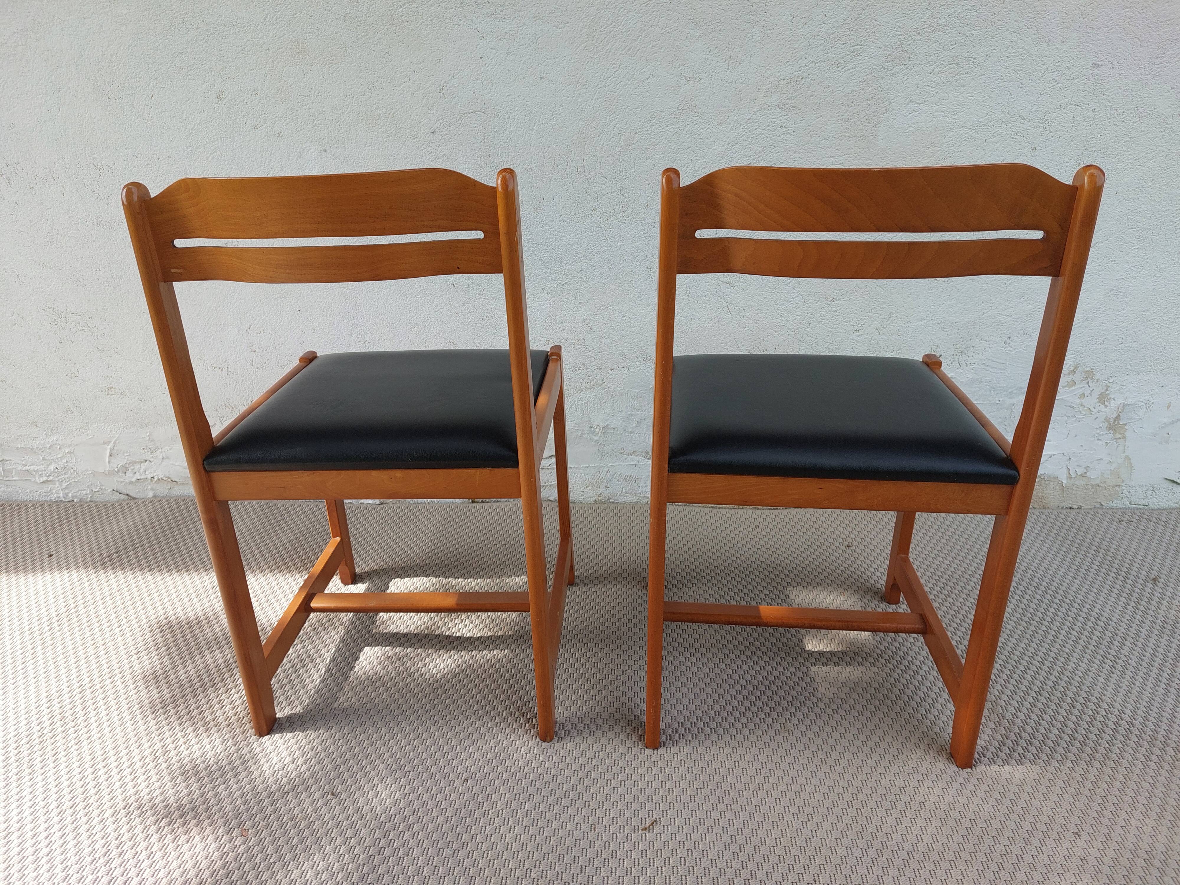 paire de chaises style scandinave, simili cuir noir