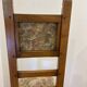 Antique chair with upholstered fabric seat