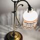 Old lamp adjustable on foot tulip golden brass.