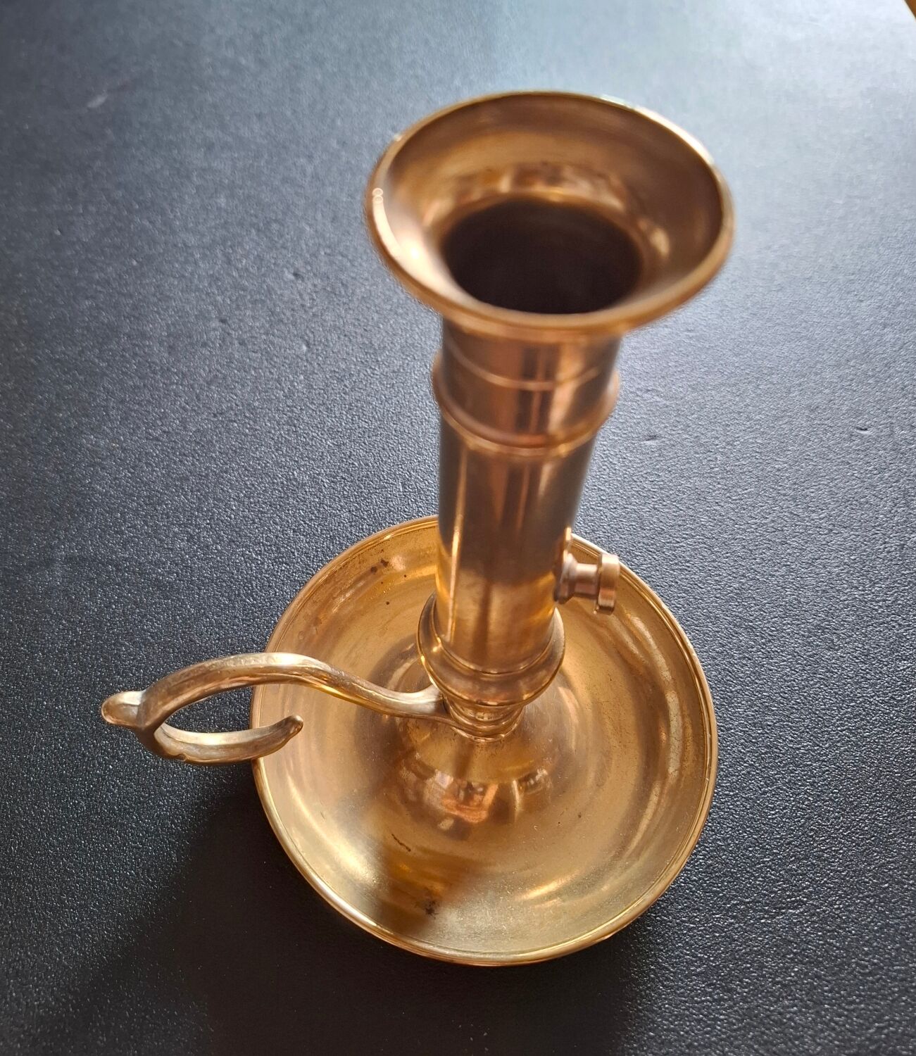 Vintage candlestick in solid bronze