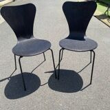 Pairs of wooden chairs