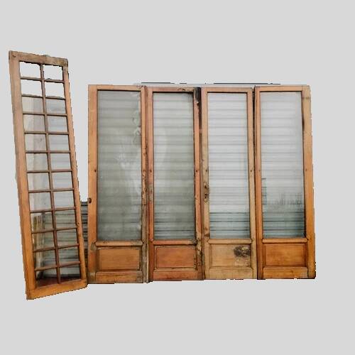 Suite de quatre portes de séparation en chêne massif XXe siècle