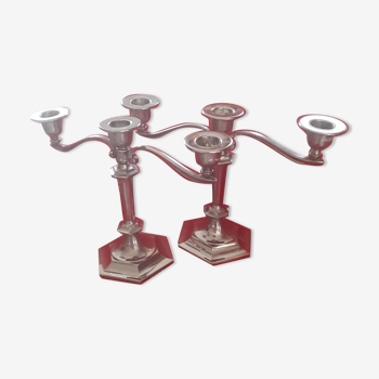 Pair of 3-spoke boigeoirs in silver metal; of the years 50.