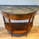 Half-moon console in mahogany with a marble top in Louis XVI style.