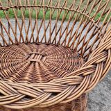 Old throne basket armchair in woven wicker