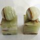 Pair of sculptural mid-century bookends in Onyx, Italy.