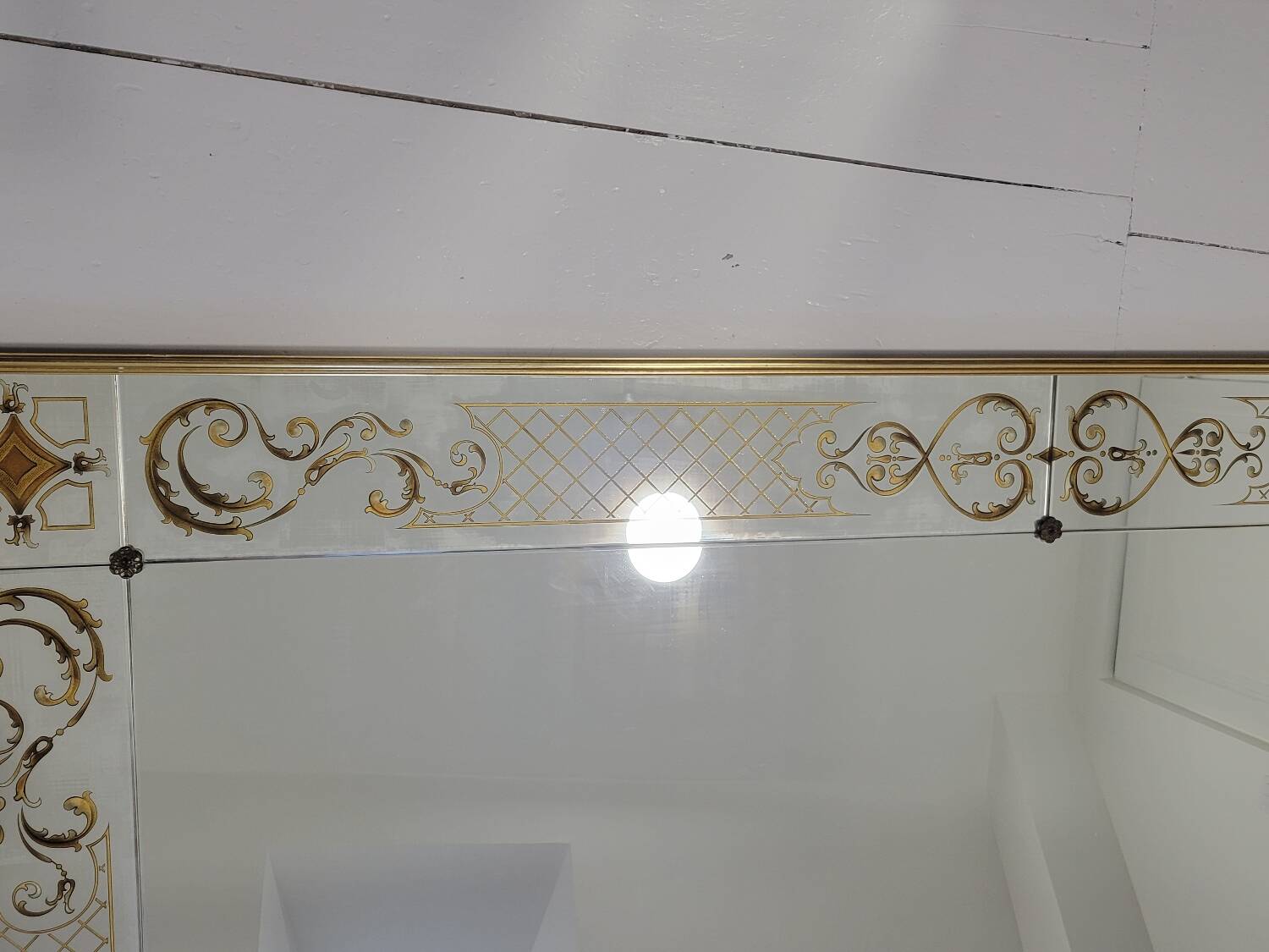 Eglomise brasserie mirror, late 19th century