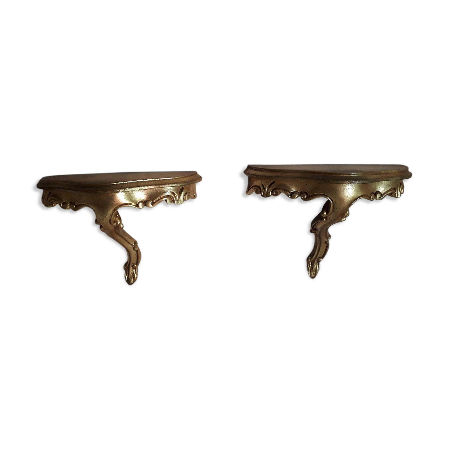2 small golden wall shelves