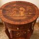 Vintage side table inlaid with Asian motifs and gilded bronze.