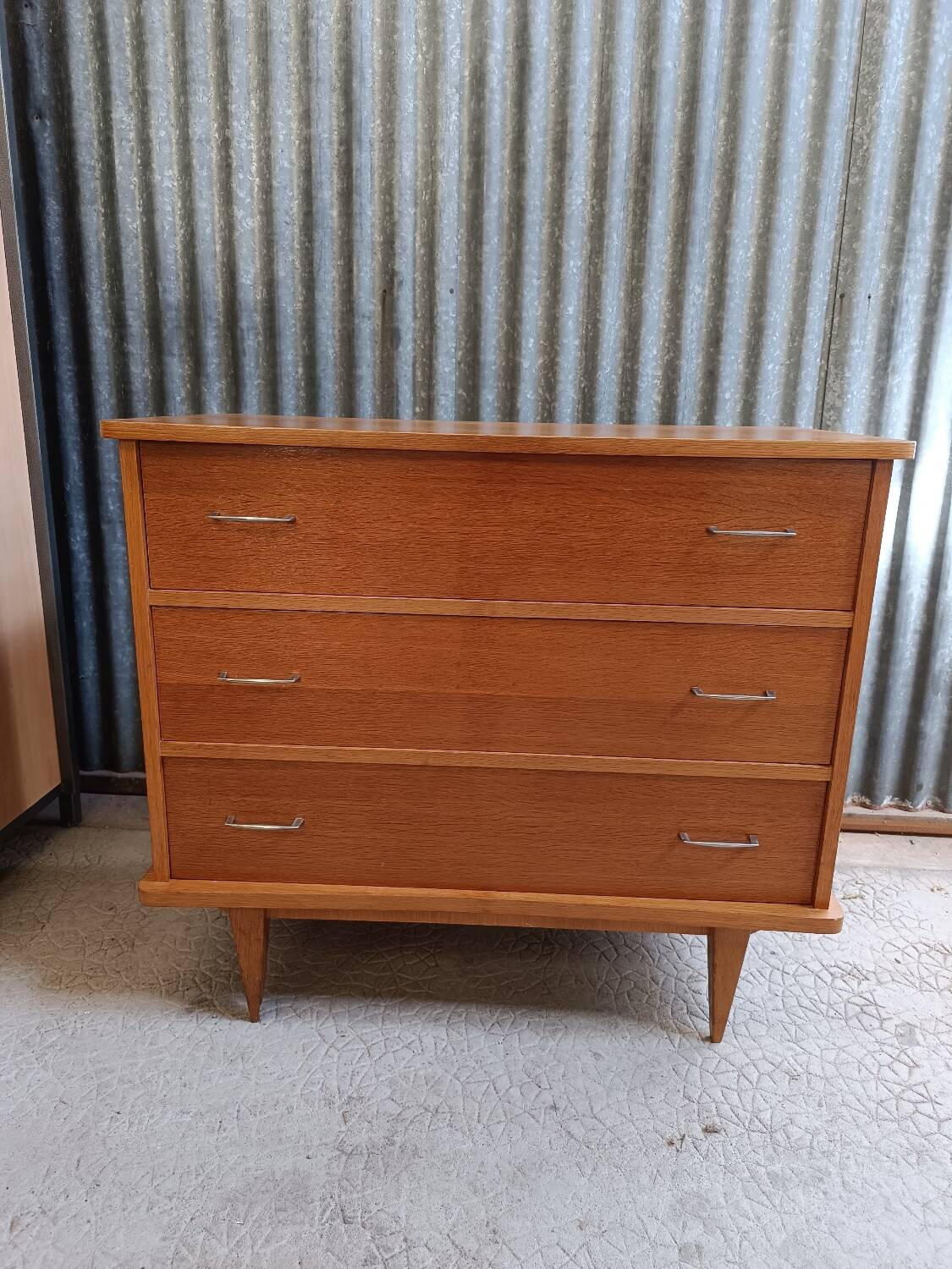 Scandinavian chest of drawers with compass feet