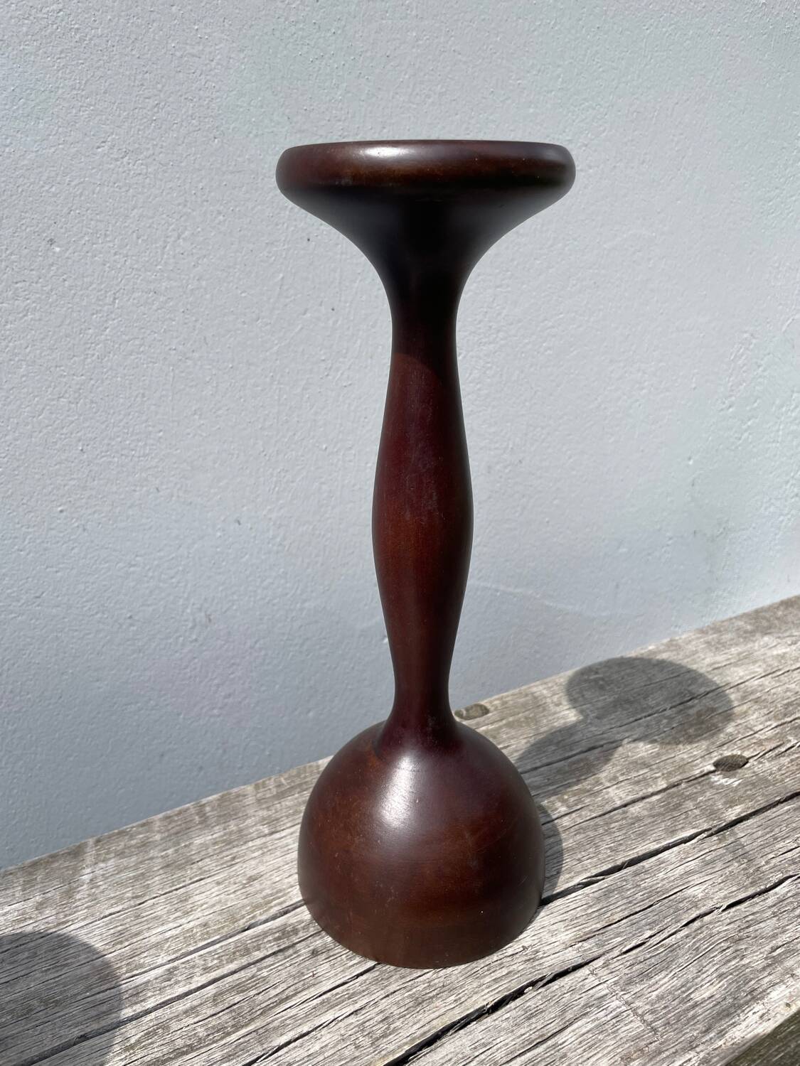 Trio of large turned wooden candlesticks