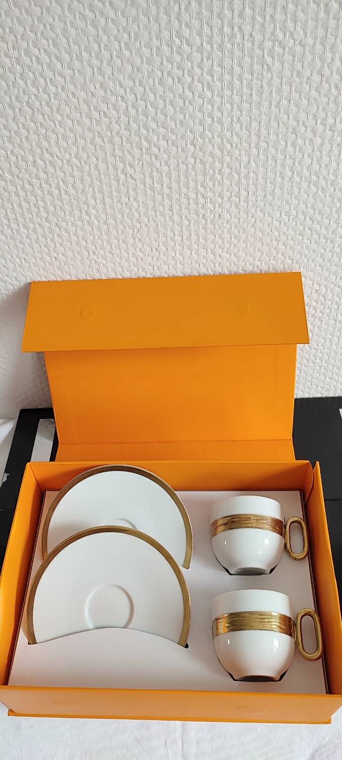 Médard de noblat cups and saucers.