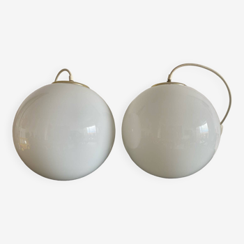 Pair of white Parscot globe pendant lights