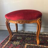Old foot rest, red velvet
