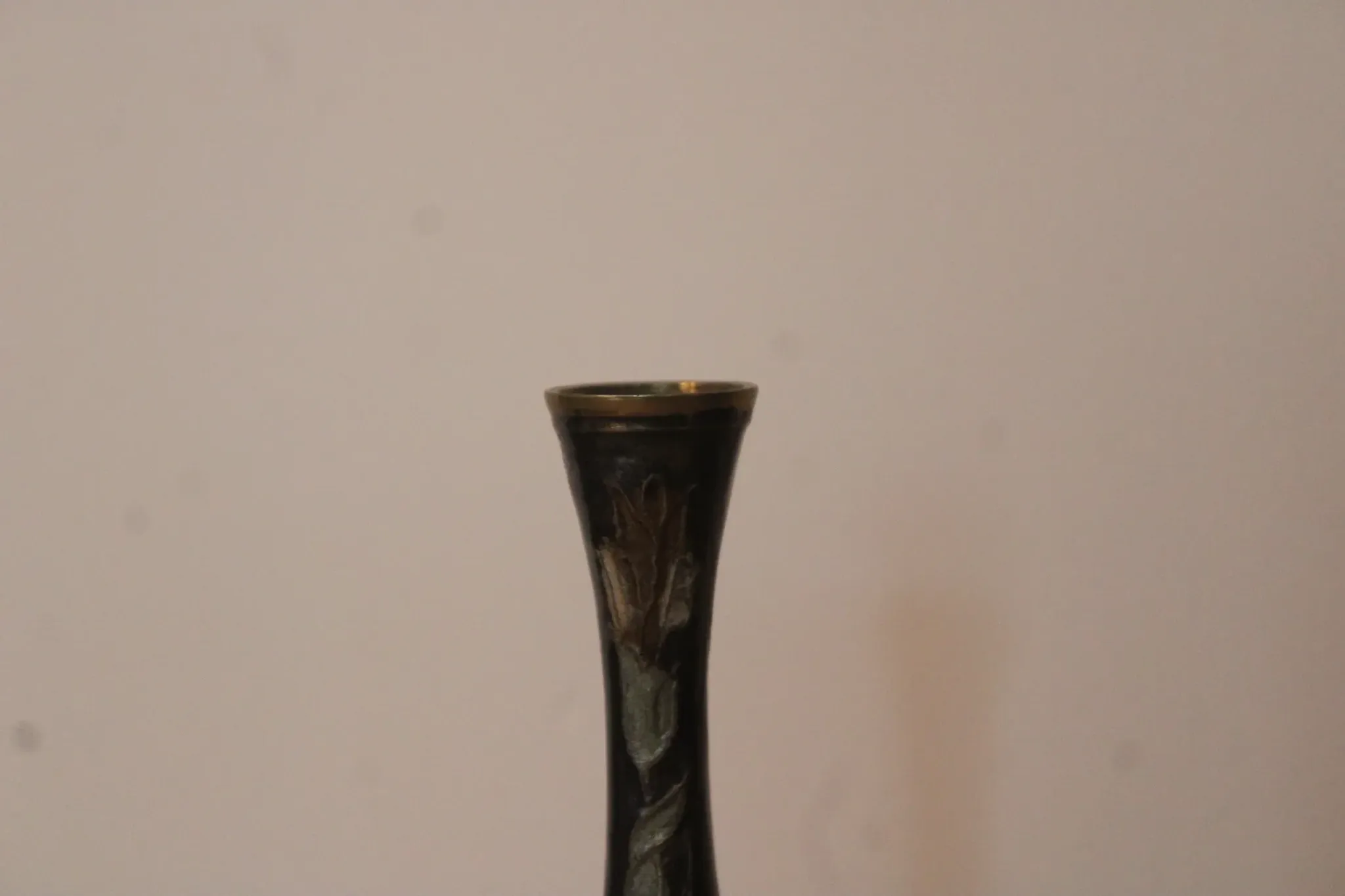 Vintage brass soliflore vase with black, red, and green floral decoration – H 18 cm