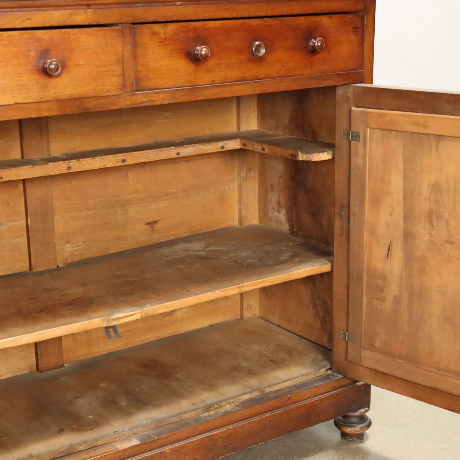 Antique double-bodied display cabinet with walnut drawers, Italy, 20th century.