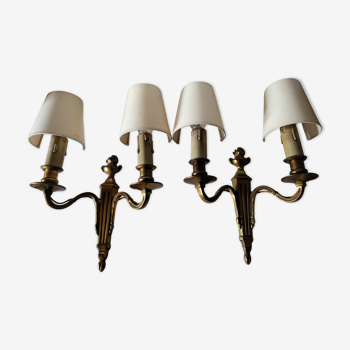 Pair of antique gilded iron wall lamps