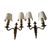 Pair of antique gilded iron wall lamps