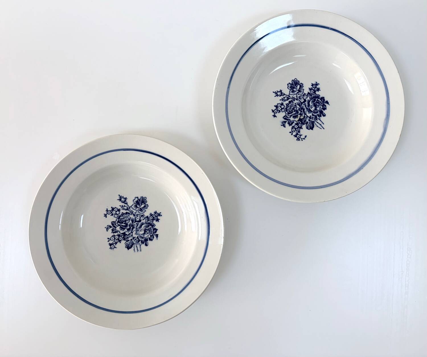 Pair of old hollow plates in earthenware