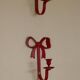 Pair of Vintage Swedish Brass Bow Candle Holder