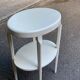 Vintage solid wood stool painted in beige.