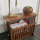 Rosewood and brass magazine stand table