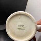 Nomar porcelain and steel teapot