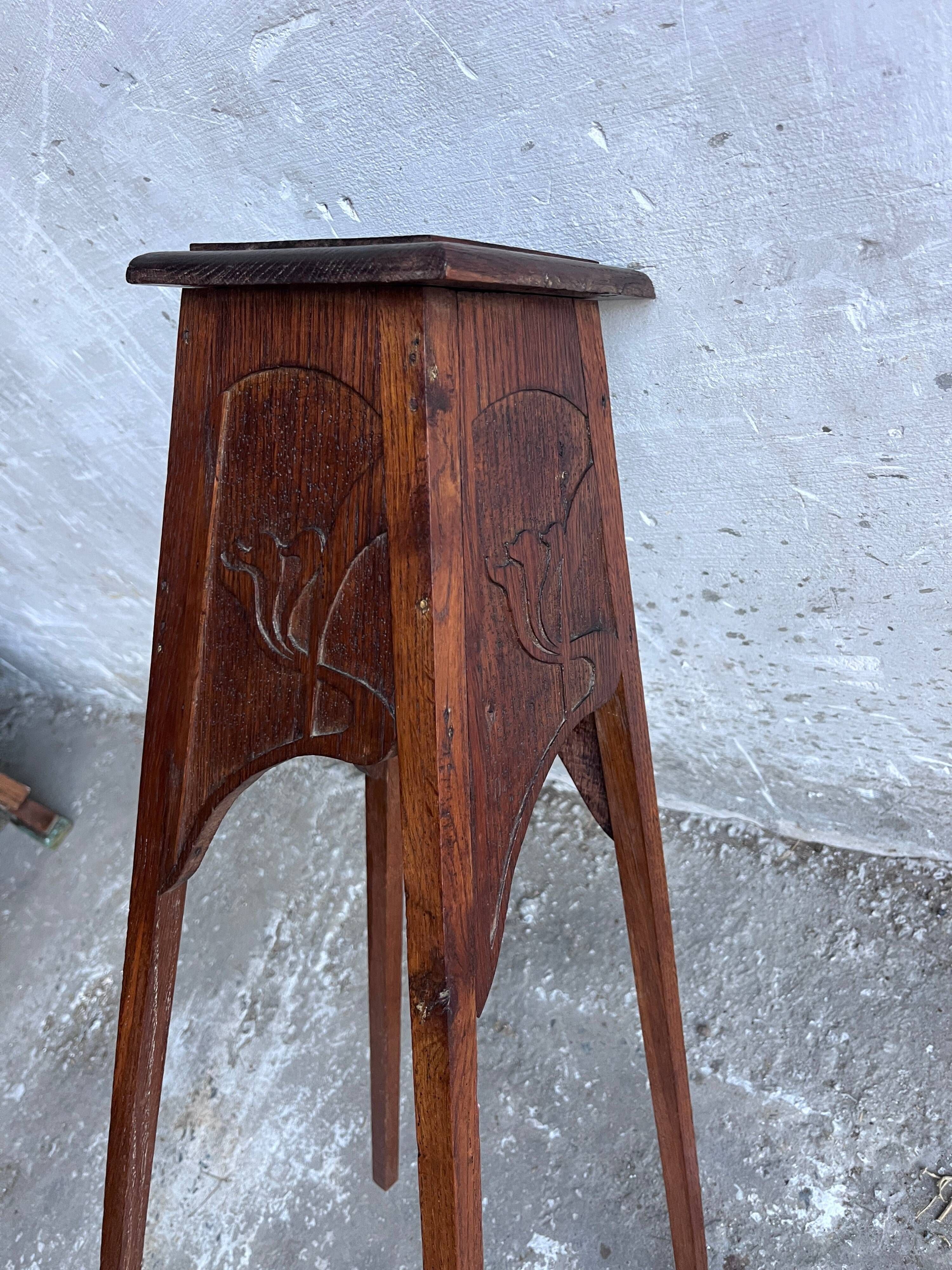 Sculpted wooden plant stand in Art Nouveau style, circa 1910.